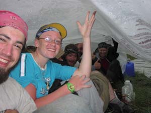 Waiting out a rain storm under a tarp.