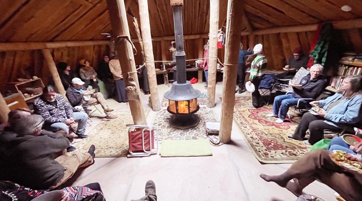 Potluck party in the earthlodge.